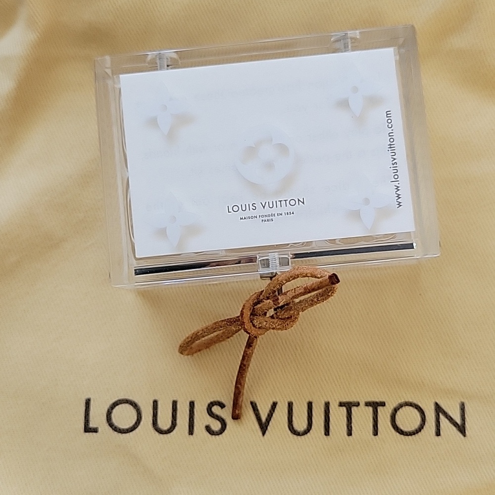 Never Used Louis Vuitton Clear Acrylic Box With Playing Dice with Leather Bow.